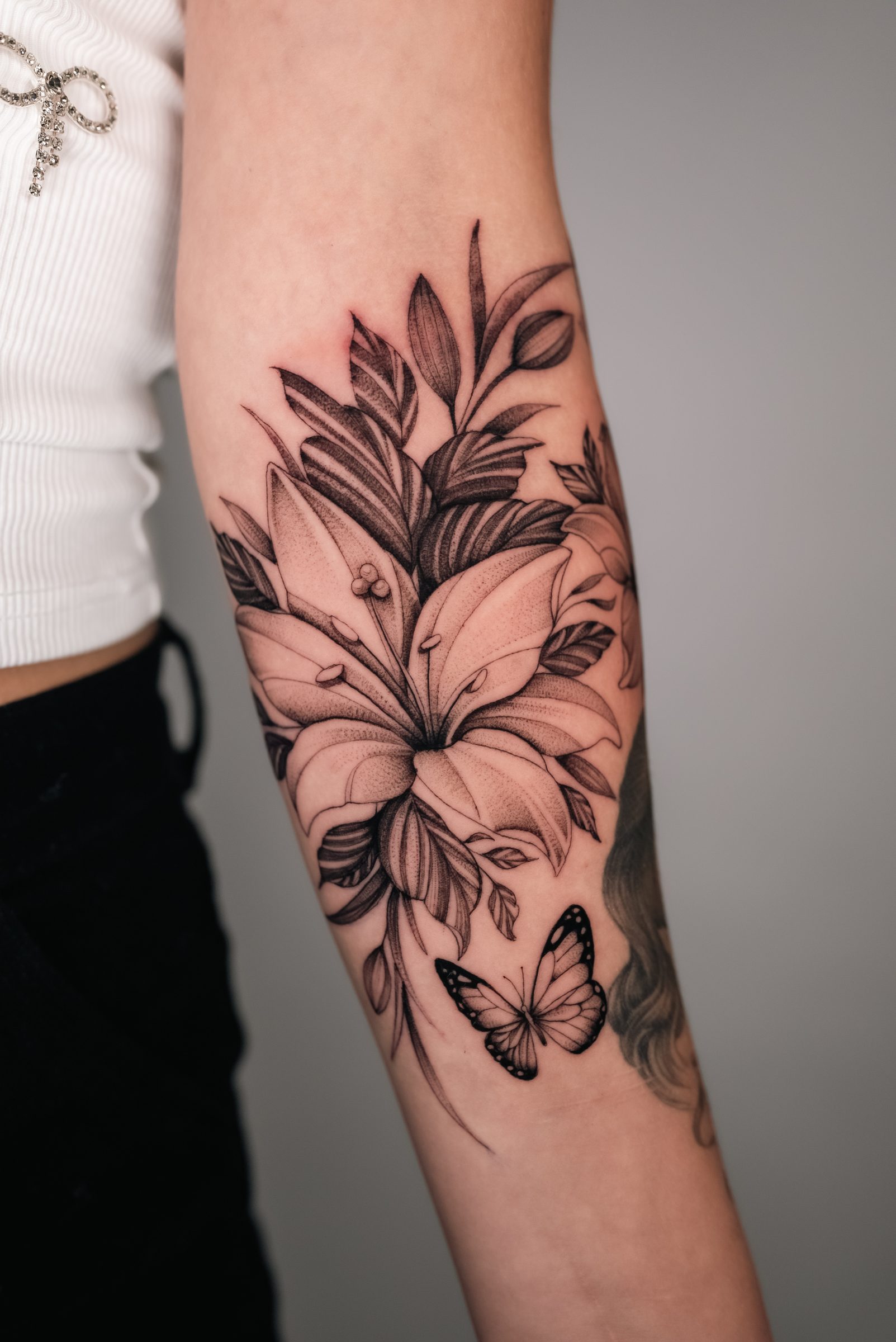 floral tattoo by Kel Otero