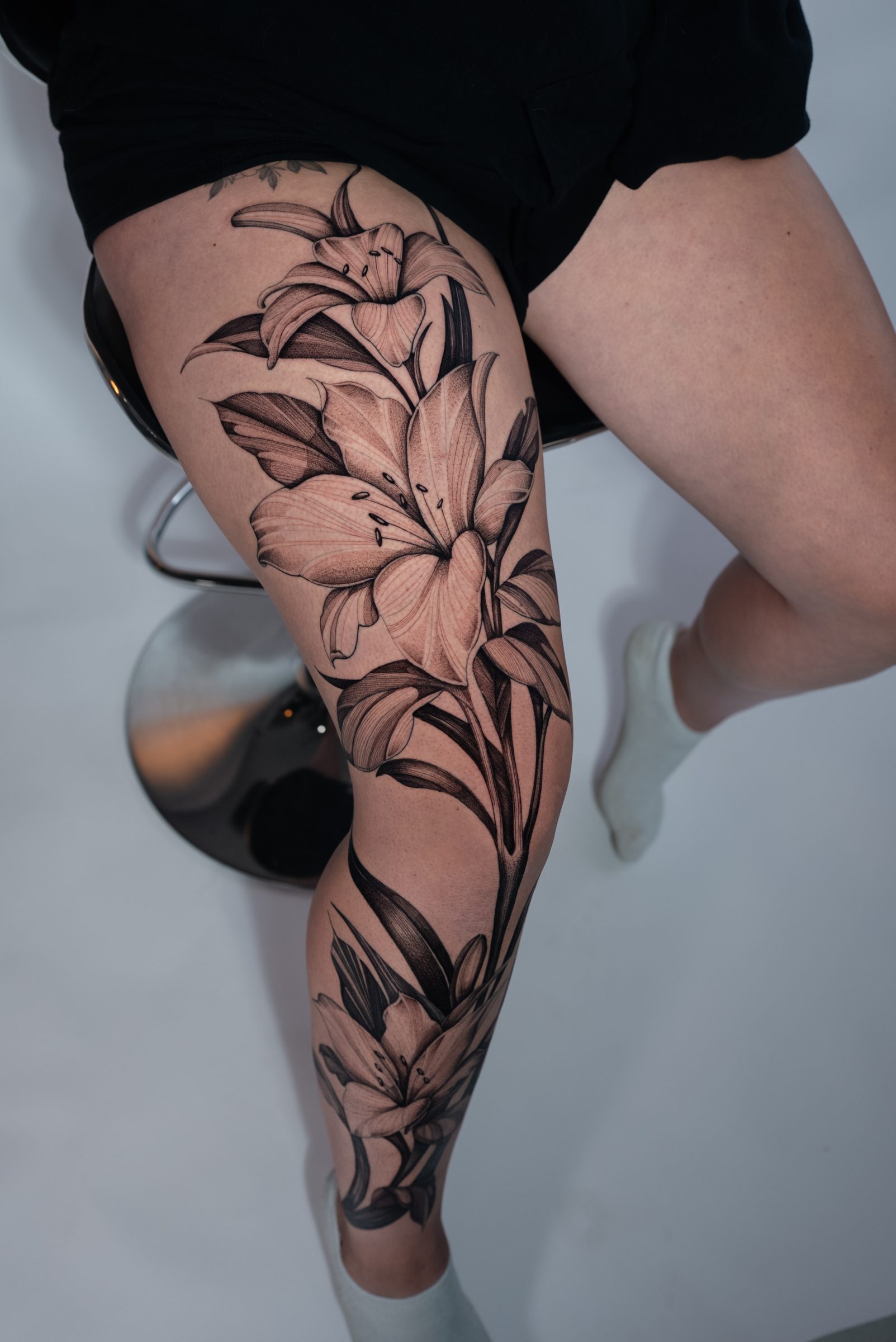 floral tattoo by Kel Otero