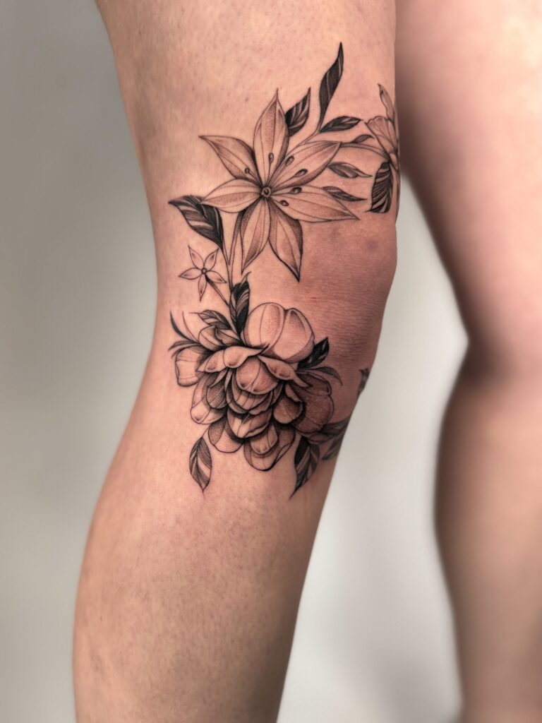 floral tattoo by Kel Otero