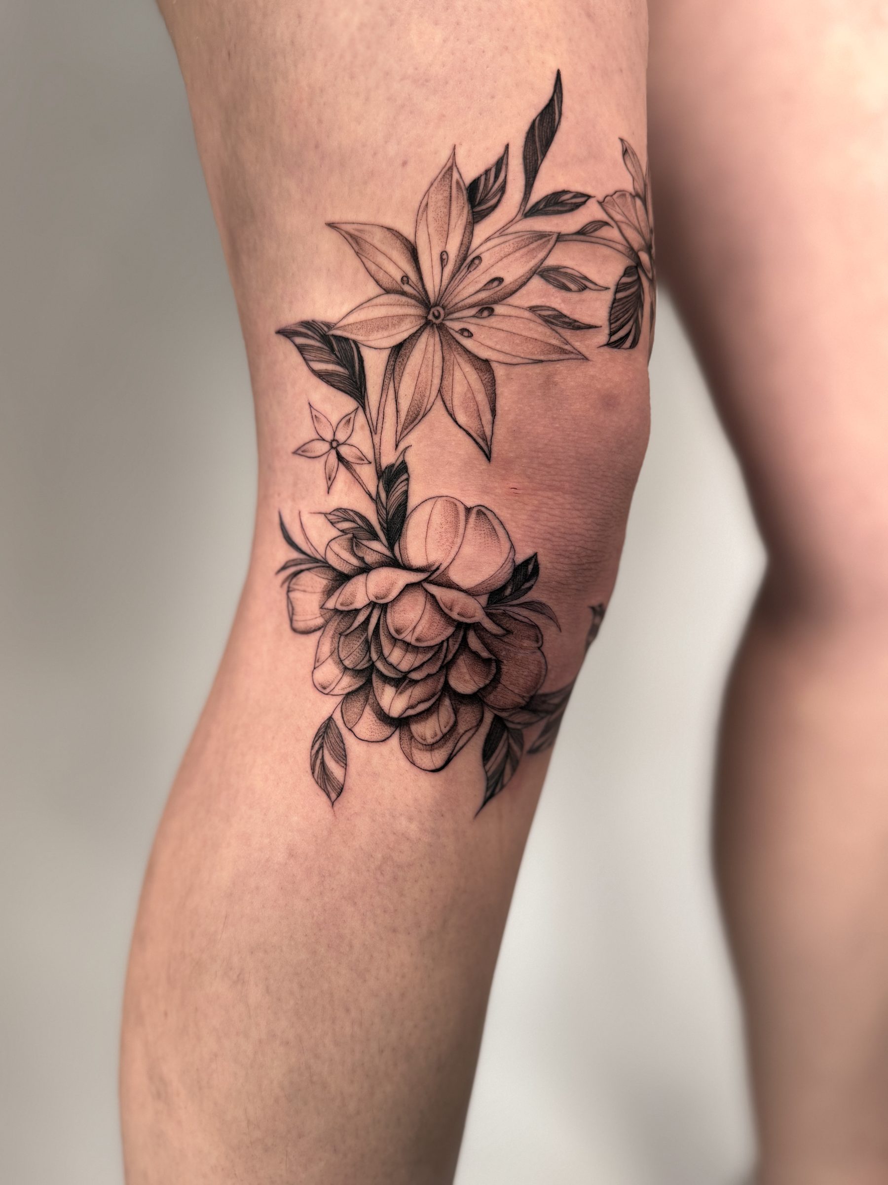 floral tattoo by Kel Otero