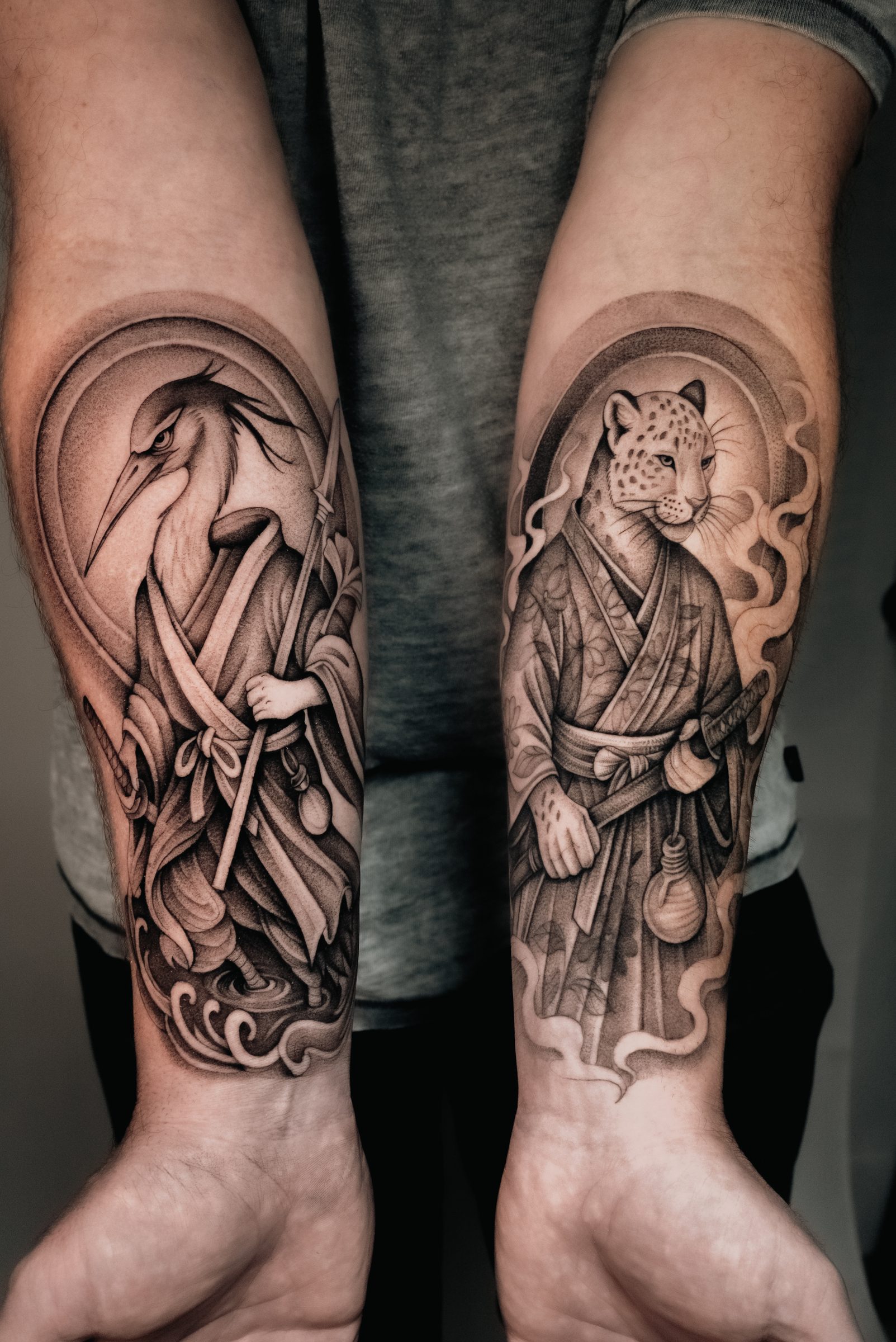 Matching samurai heron and leopard forearm tattoos by Kel Otero