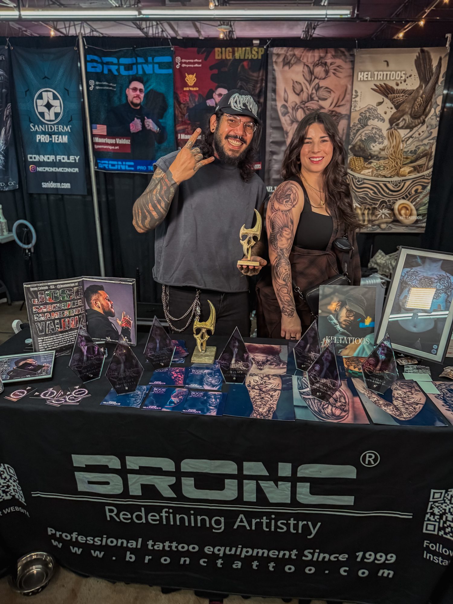 Kel Otero at his booth with his awards at the Summit Invitational