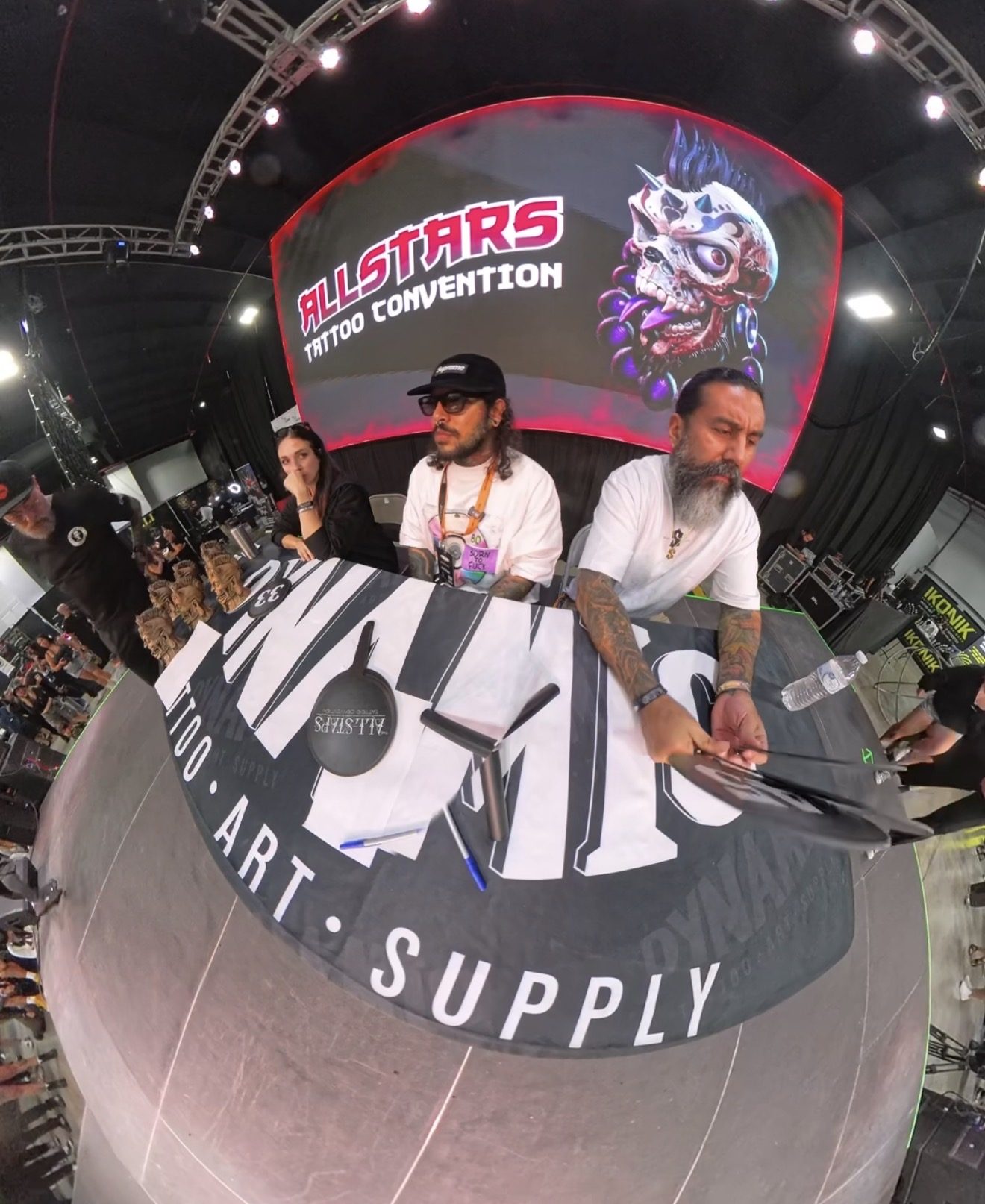 Kel Otero judging a tattoo competition in Miami